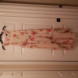 Cream colored Floral high low torrid blouse